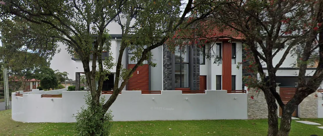 Residence surrounded by established trees